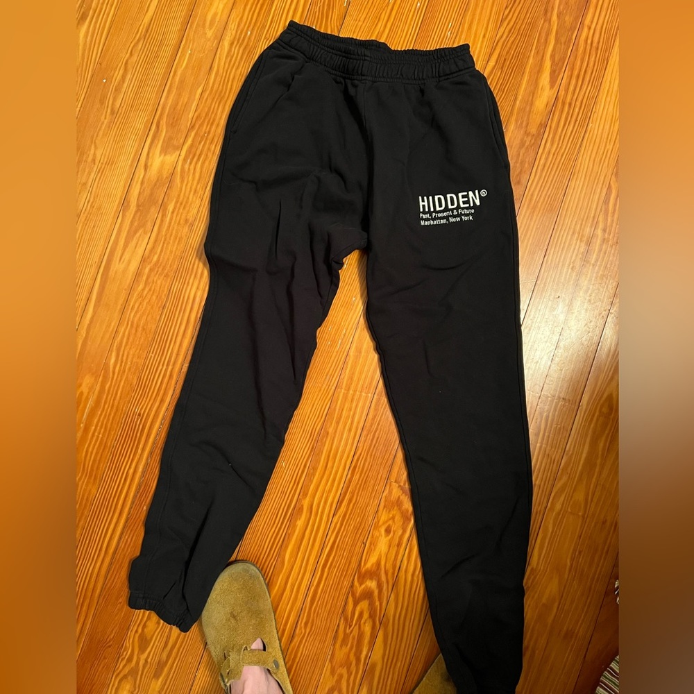 Hidden black sweats